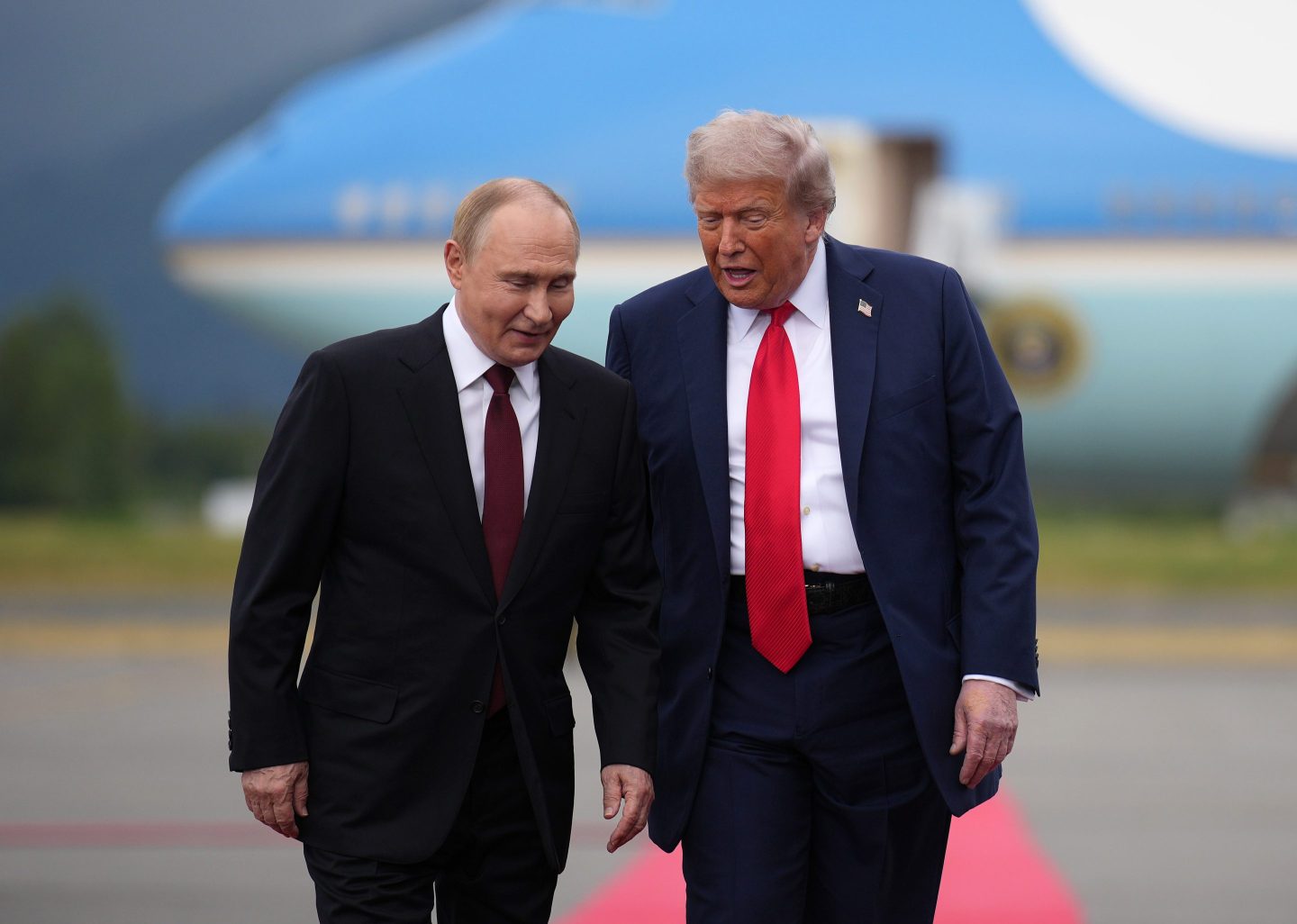 President Donald Trump greets Russian President Vladimir Putin as he arrives at Joint Base Elmendorf-Richardson in August 2025 in Anchorage, Alaska.
