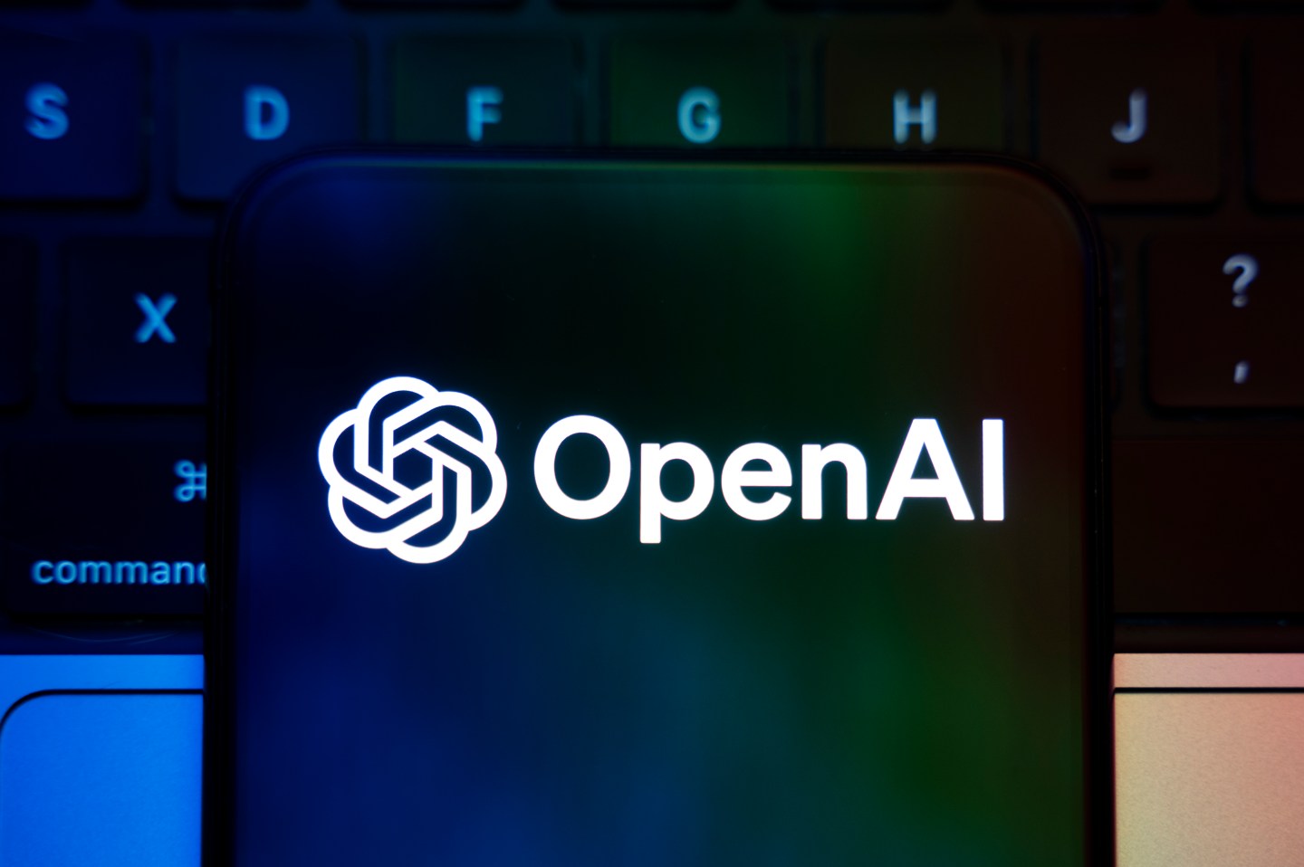 OpenAI logo on a keyboard.